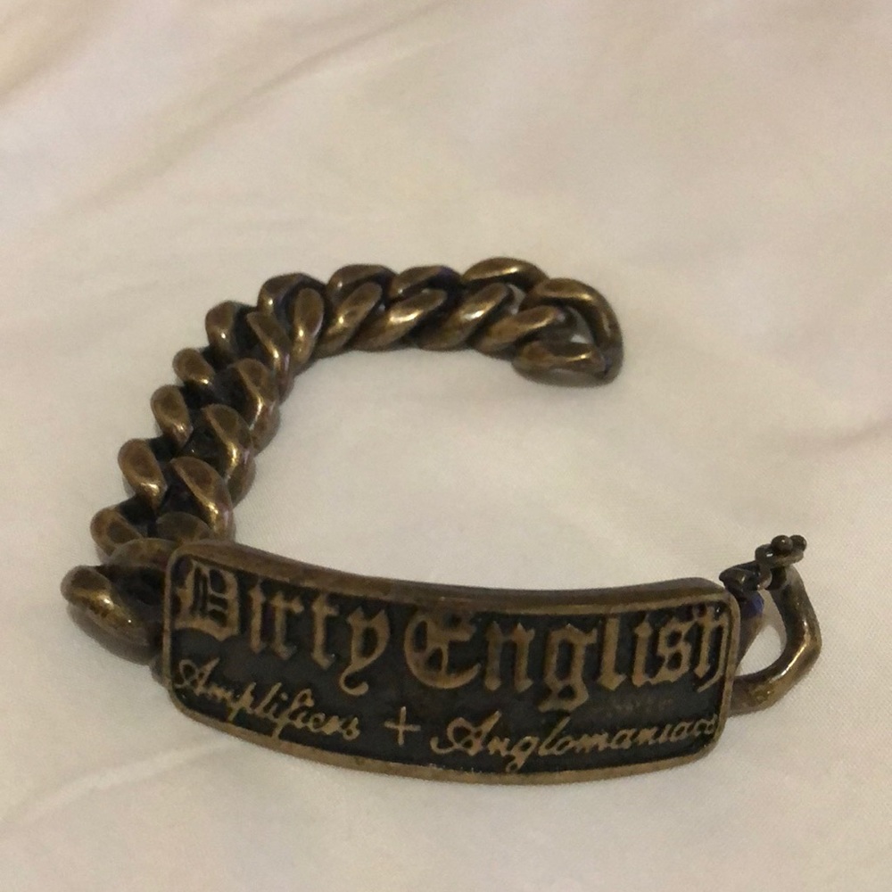 Dirty English/juicy couture bracelet